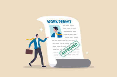 Work permit document approved, contract agreement athority, legal paperwork for employment with stamp signature, immigration permission concept, businessman employee with  approved work permit paper.